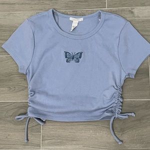 Tilly’s blue butterfly top
